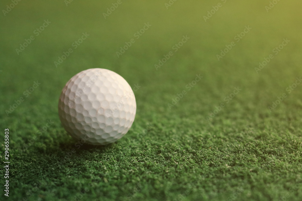 golf ball on green grass golf ball on green grass