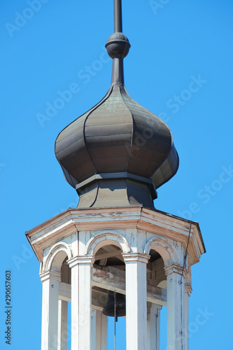 Belfry of the ancient Catholic Church photo