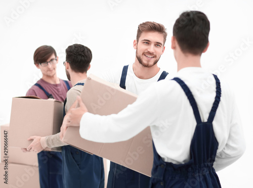 Delivery men with cardboard boxes on white background.