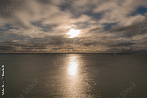 Long exposure of the sun, clouds and the sea in England, UK. © Hal Photography