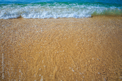 Fototapeta Naklejka Na Ścianę i Meble -  beautiful sandy beach and soft blue ocean wave