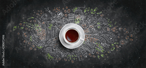 Coffee chalk illustrated concept on black board background - white coffee cup, top view with chalk doodle illustration about coffee, beans, morning, espresso in cafe, breakfast. Morning coffee