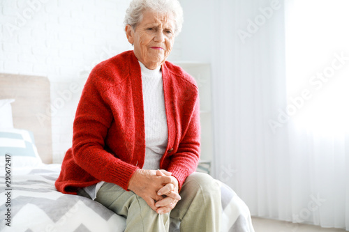 Senior woman suffering from...