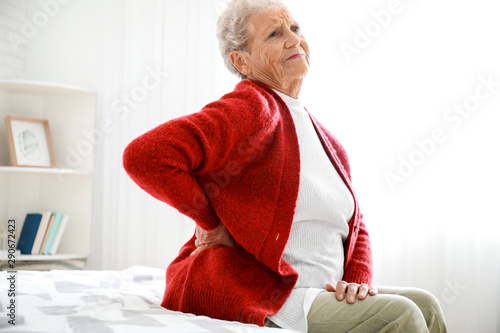 Senior woman suffering from...