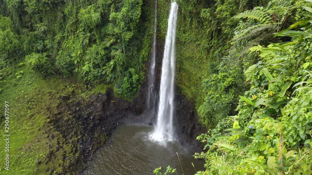 Fuipisia Waterfall in Samoa amongst the lush green landscape Fuipisia Waterfall in Samoa amongst the lush green landscape