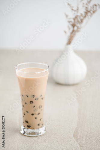 Taiwan milk tea with bubbles, ฺHomemade Milk Bubble Tea whit dessert and table decoration, Popular Asian drink