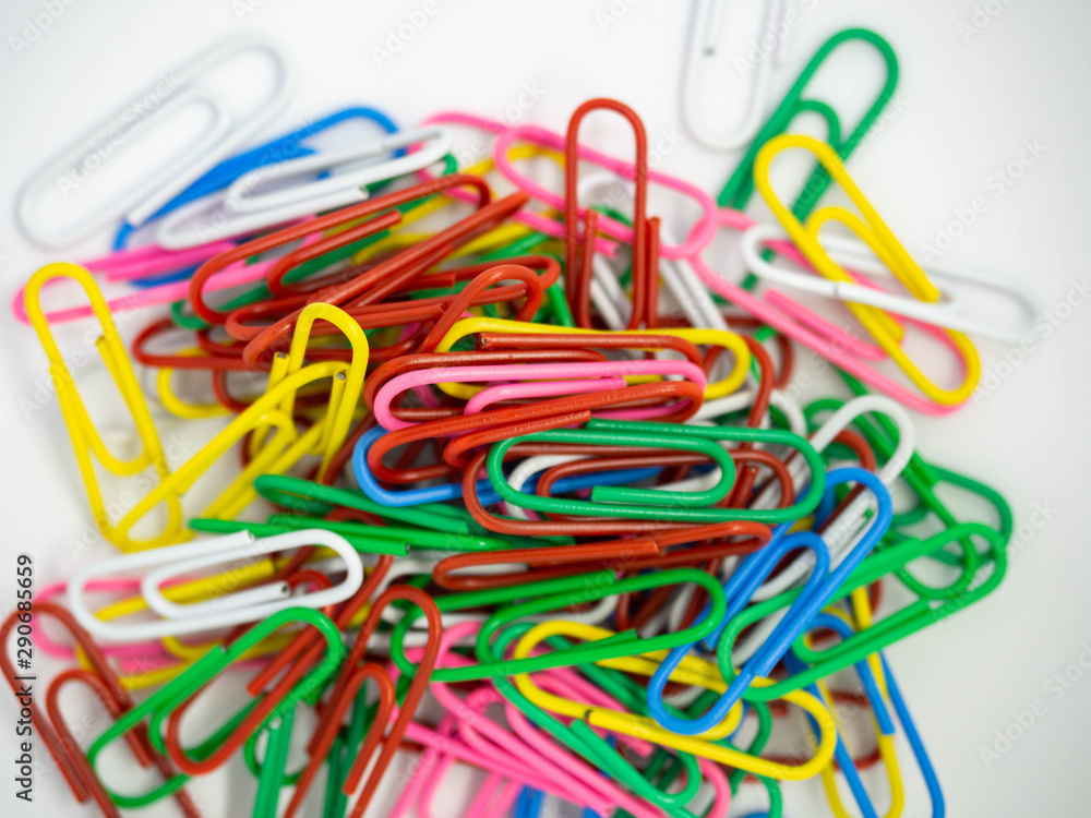 Colorful PaperClip,Cluster isolated on white background,Texture,Close up,Material Office,Business,Rad,Yellow,White,Green,Blue Colorful PaperClip,Cluster isolated on white background,Texture,Close up,Material Office,Business,Rad,Yellow,White,Green,Blue