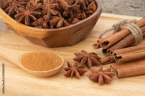 Star anise isolated on wooden background.