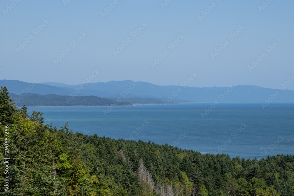 Beautiful view from the high shore of the sea bay. Sakhalin Island, Bayan Peninsula, Mordvinova Bay, Russia. Beautiful view from the high shore of the sea bay. Sakhalin Island, Bayan Peninsula, Mordvinova Bay, Russia.