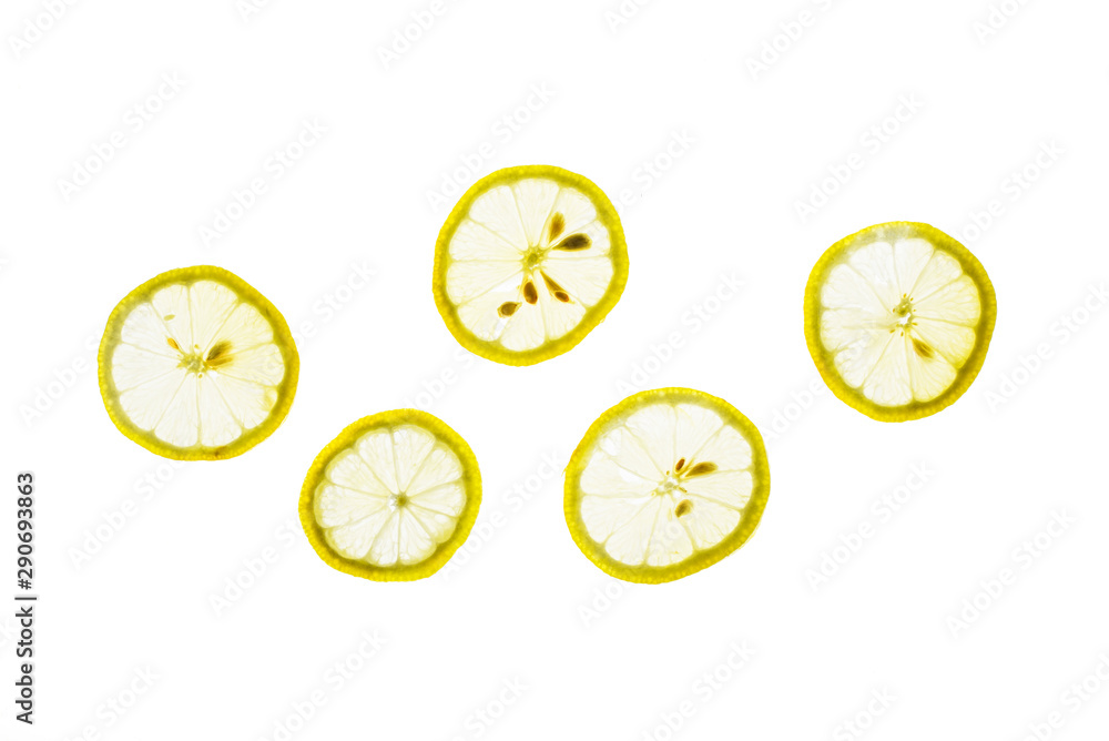 Fresh sliced lemon isolated on a white background.