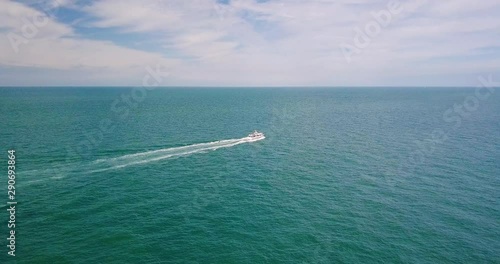 Drone footage of a yacht sailing off the Normandy coast in Etretat France photo