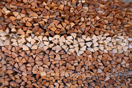 A stack of oven-ready firewood consisting of birch and softwood