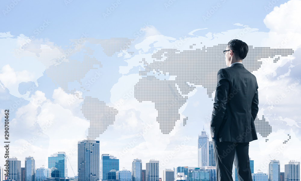 Concept of business success and control with confident boss against cityscape background Concept of business success and control with confident boss against cityscape background
