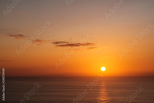 sun over ocean horizon, sunset sky over water -