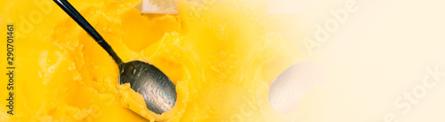 Closeup of ghee butter - famous cooking ingredient, element of bulletproof diet. Wide panoramic half banner image. Copy space. 