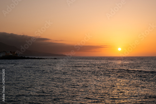 ocean coast with sunset sky background © hanohiki