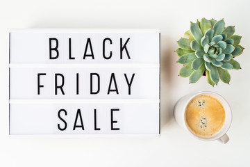 Flat lay black friday sale written on light box