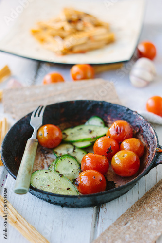 Fresh and juicy roasted tomatoes and cucumbers.