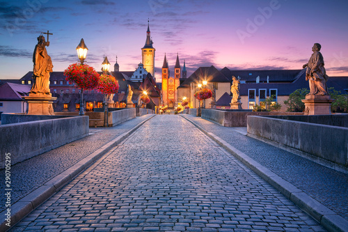 Wurzburg, Old Main Bridge. Cityscape image of the old town of Wurzburg with Old Main Bridge over Main river during beautiful sunrise. photo