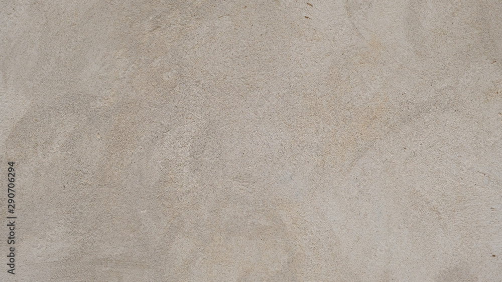 Naklejka premium The plastered wall of a building. Background for design