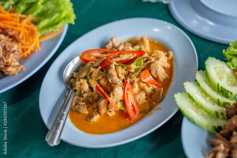 The pork curry on dish with meat and vegetable. The pork curry on dish with meat and vegetable.