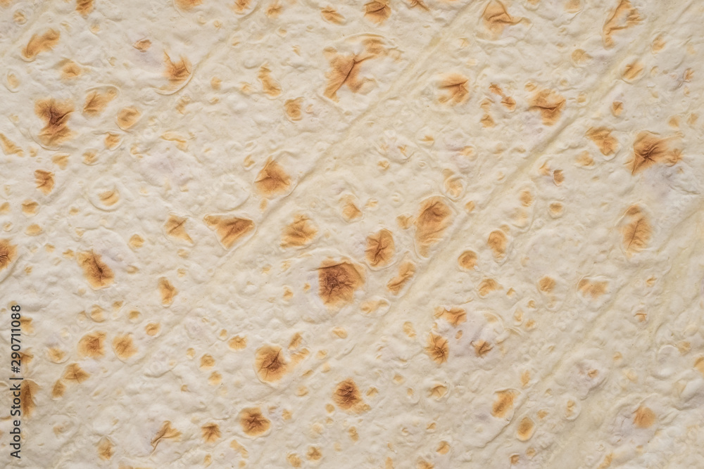 thin wheat cake - pita bread. Food background, close up