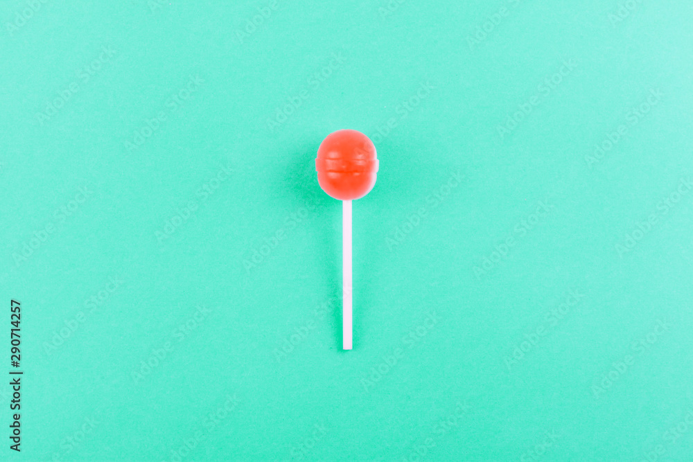 lolipop on mint blue pastel background. lolipop on mint blue pastel background.