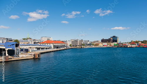 Beautiful seascape norwegian coastline, coast of Kristiansand with buildings, Scandinavia, Norway. July 2019