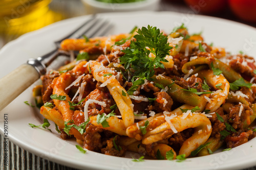 Maccheroni al ferretto with beef in ragu bolognese. Front view. © gkrphoto