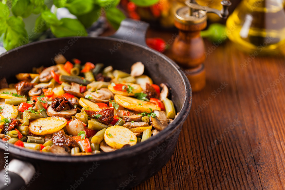 Fried pan vegetables, with mushrooms and dried tomatoes. Seasoned with a mix of herbs. Fried pan vegetables, with mushrooms and dried tomatoes. Seasoned with a mix of herbs.