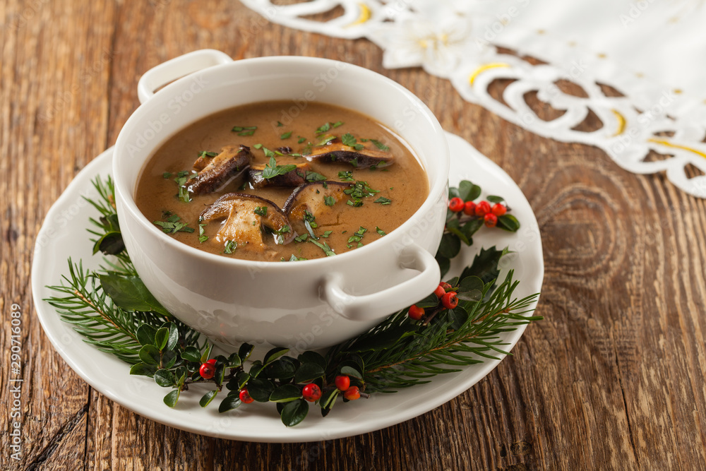 Traditional mushroom soup, made from porcini mushrooms. Christmas decoration. Traditional mushroom soup, made from porcini mushrooms. Christmas decoration.