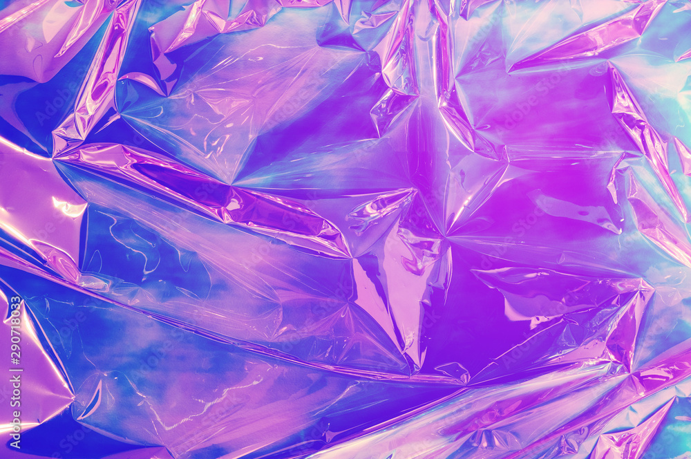 Holographic iridescent surface wrinkled foil color. Holographic iridescent surface wrinkled foil color.