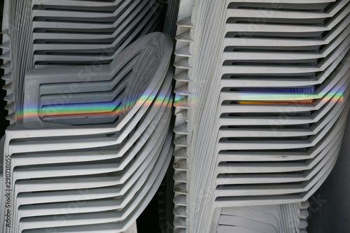 rainbow reflection on a chair © alimyakubov