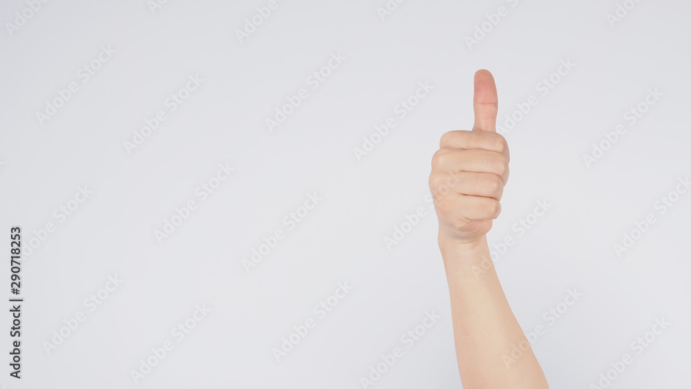 Male's right hand doing thumbs up sign on white background. Male's right hand doing thumbs up sign on white background.