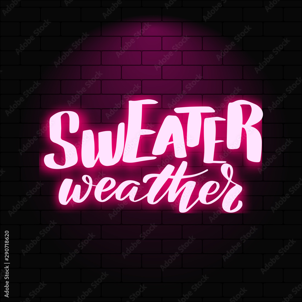 Neon glowing lettering on a brick wall background. Neon glowing lettering on a brick wall background.