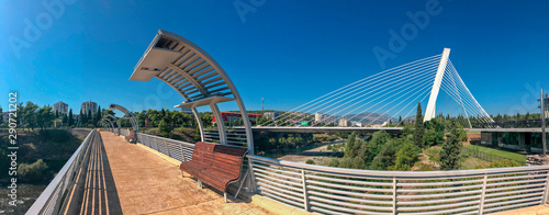 Panoramic view of the Millenium Brigde, from a project by Santiago Calatrava, seen from the Moscow Bridge. Modern architecture of the capital of Montenegro. Podgorica. 09/15/2019