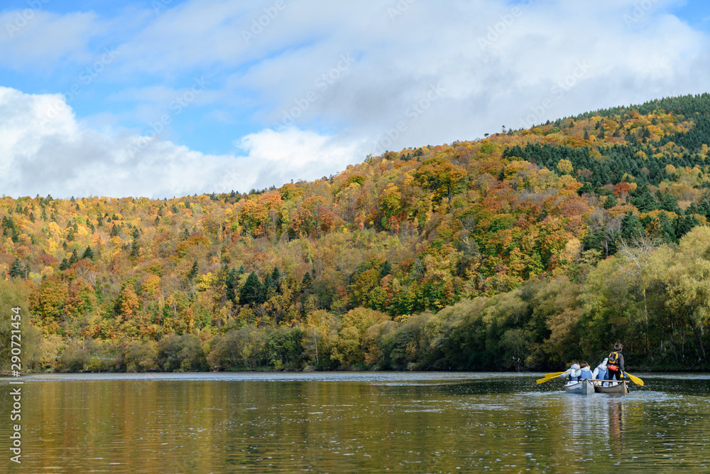 Tourist canoeing at countryside in Hokkaido Japan Tourist canoeing at countryside in Hokkaido Japan