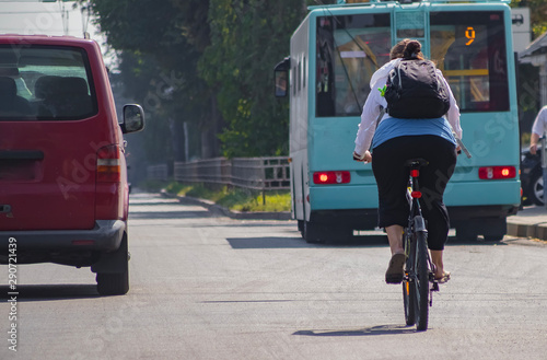 Cyclist rides on the highway on a bicycle