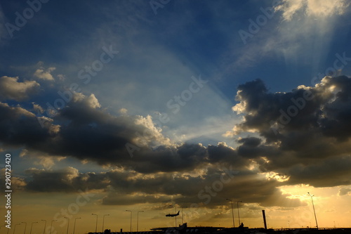 Sunset background and sun beam on the open seaGold sunset light on the ocean.	 photo