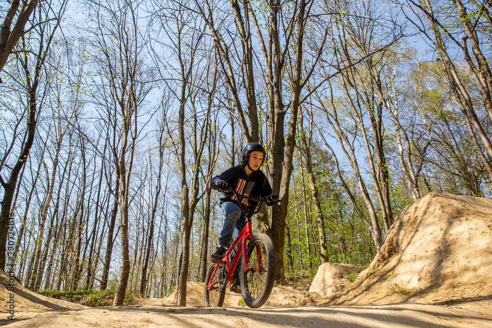 cyclist in the mountain, cyclist riding mountain bike in the forest
