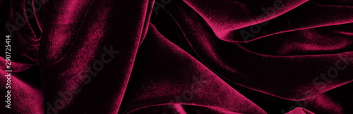 Long banner velvet texture dark red pink  color background, expensive luxury fabric,  wallpaper. copy space photo