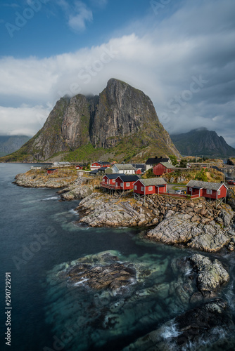 View of Hamnøy or Hamnøya, a small fishing village in Moskenes Municipality on Lofoten islands in Nordland county, Norway from the photo spot on the bridge nearby photo