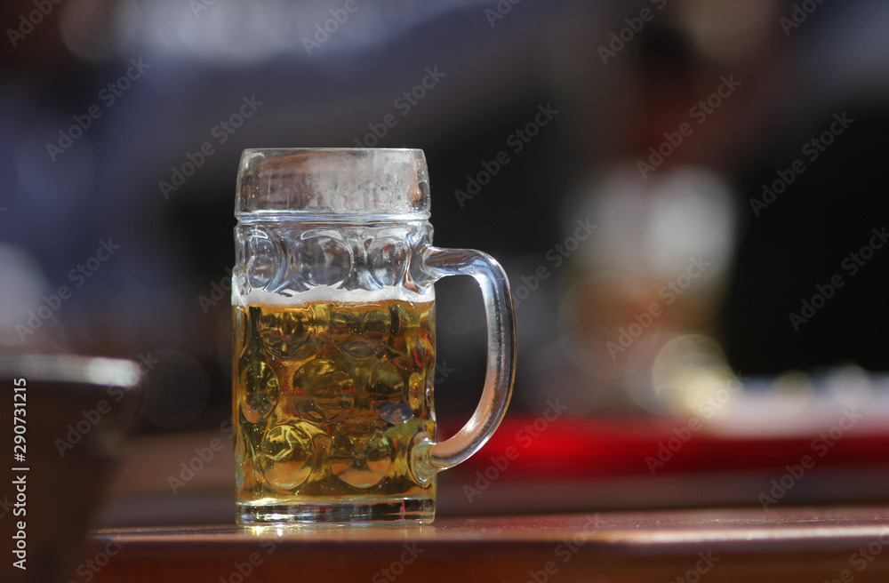 Silhouette of half drunk-up beer glass mug, 1 liter glas of beer. 