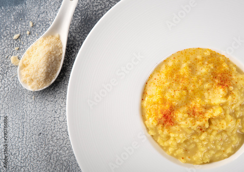 Fotografie, Obraz Risotto Milanese with saffron and parmesan cheese