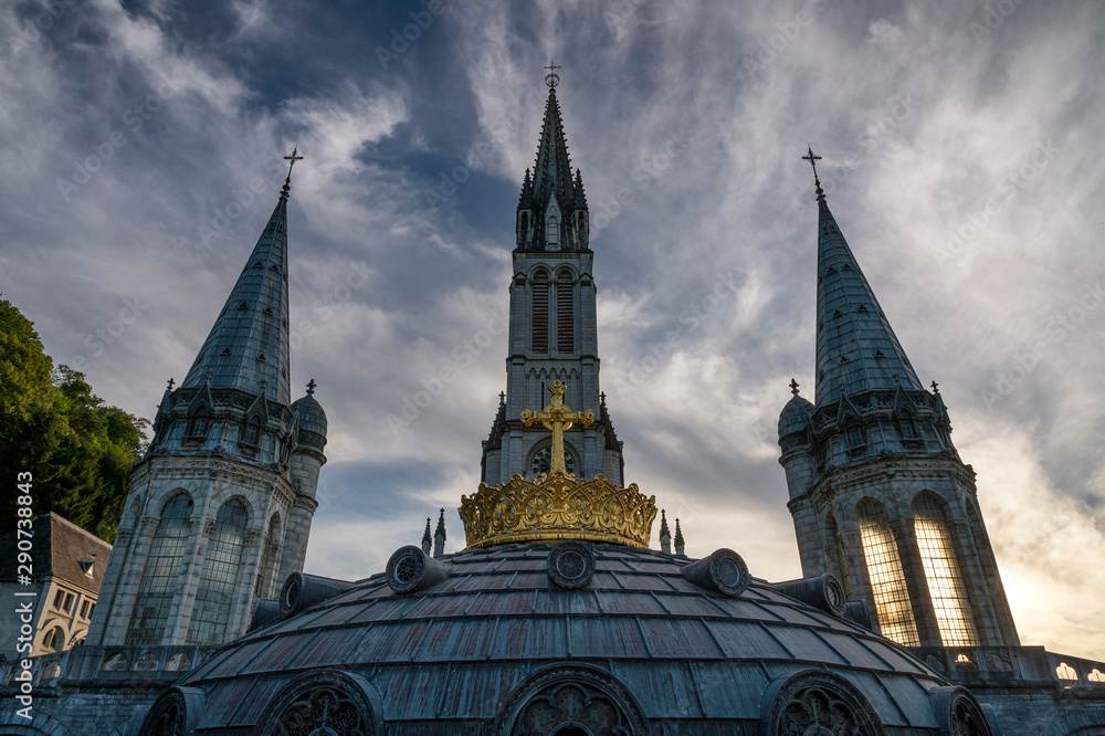 Front view of the sanctuary of Our Lady of Lourdes (France) during sunset. Front view of the sanctuary of Our Lady of Lourdes (France) during sunset.