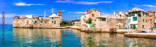 Landmarks of Croatia: Kastel Gomilica - old sea castle and traditional fishing village in Kastela, central Dalmatia