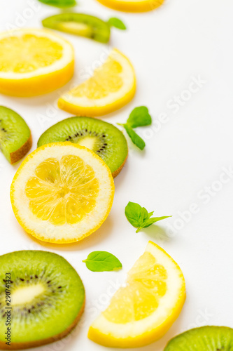 Top View of Lemon Kiwi and Peppermint on White Background, Free Space for Text