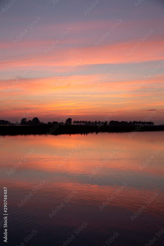 Sunset over lake in Dutch province Friesland