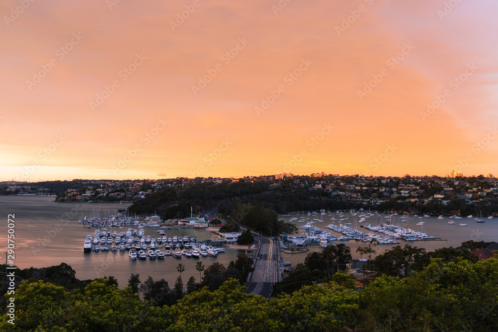 Warm sunrise sky view over the Spit Bridge. Sydney, Australia.
