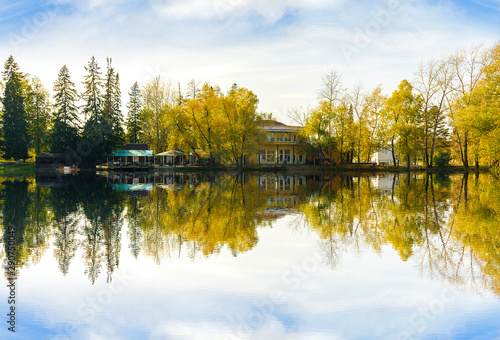 reflection of autumn trees in lake